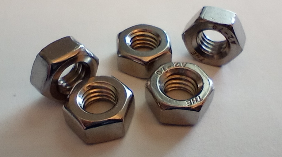 Five M6 hex nuts.