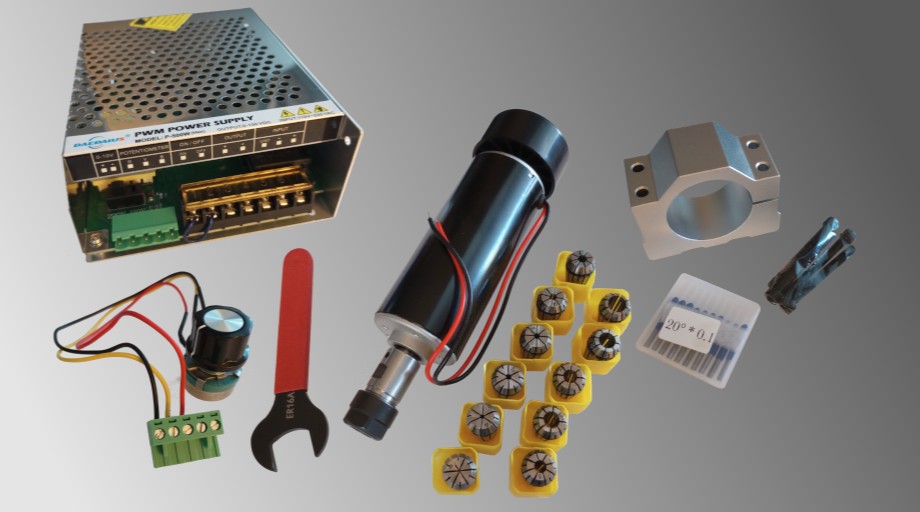 One 500 watt power supply and matching potentiometer, one ER-16 collet wrench, one 500 watt, 52mm diameter spindle motor, eleven ER-16 collets, ten twenty degree by 0.1mm v-bits, and one 52mm motor mount cuff with mounting hardware.